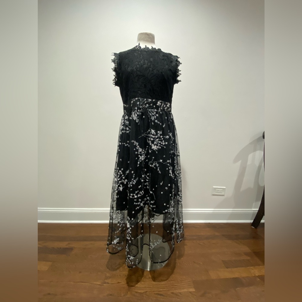 Beautiful lengthened dress with no defects or stains